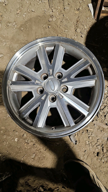 4 x 7/0R16  Ford